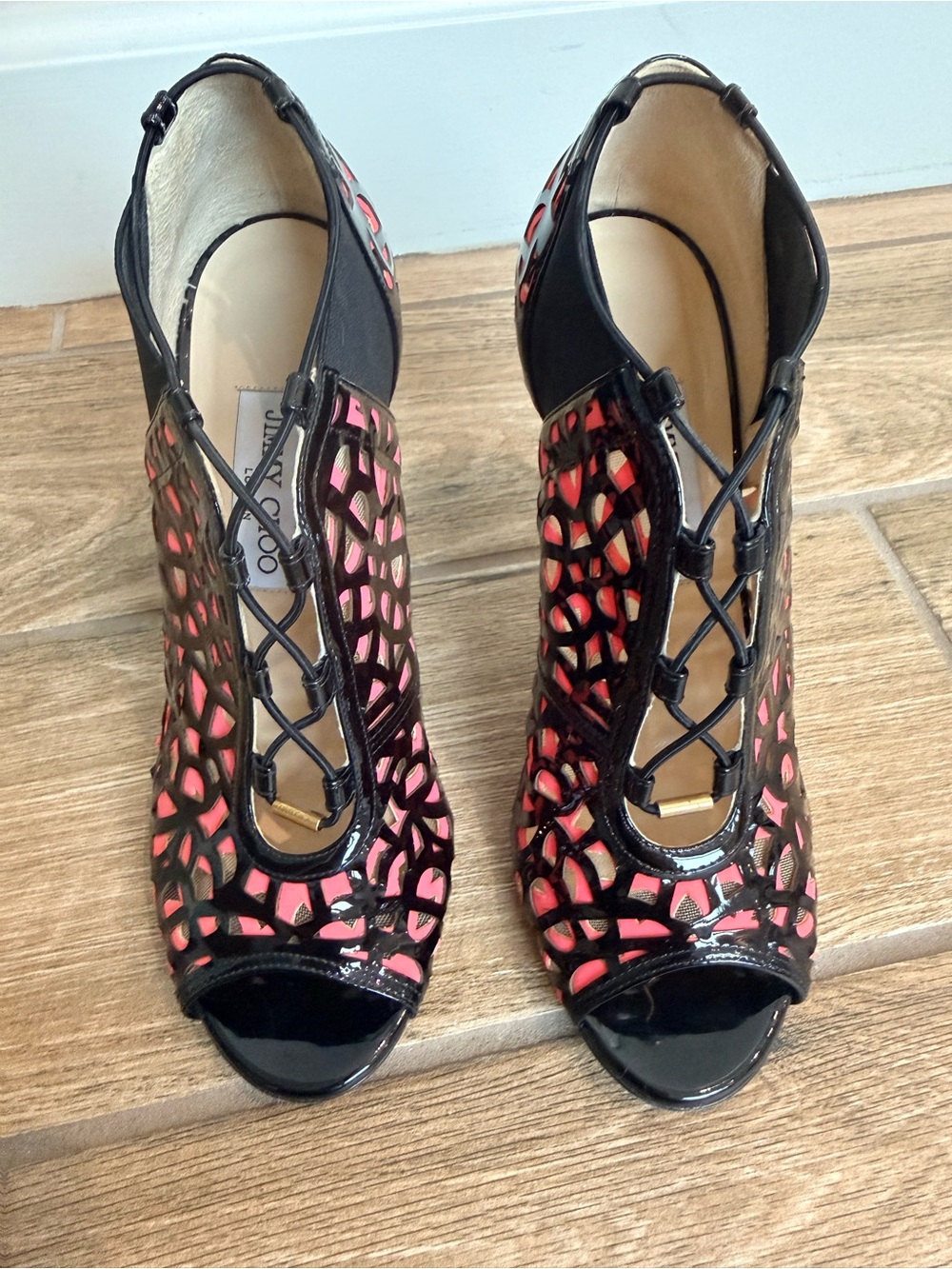 Jimmy Choo Black Laser-Cut Peep-Toe Heels with Pink Lining